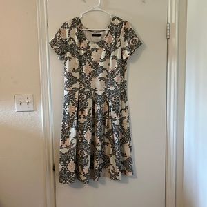 Cute and flattering dress from Mikarose. Size L